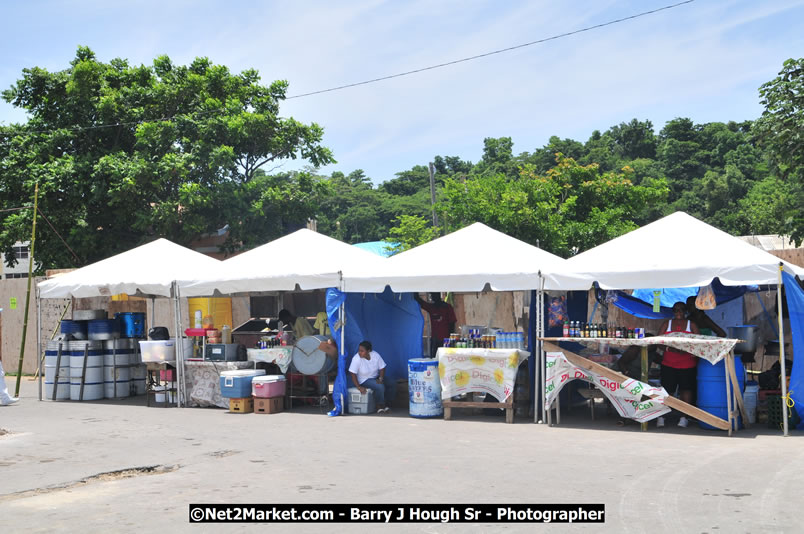 Lucea Cross the Harbour @ Lucea Car Park - All Day Event - Cross the Harbour Swim, Boat Rides, and Entertainment for the Family - Concert Featuring: Bushman, George Nooksl, Little Hero, Bushi One String, Dog Rice and many local Artists - Friday, August 1, 2008 - Lucea, Hanover Jamaica - Photographs by Net2Market.com - Barry J. Hough Sr. Photojournalist/Photograper - Photographs taken with a Nikon D300 - Negril Travel Guide, Negril Jamaica WI - http://www.negriltravelguide.com - info@negriltravelguide.com...!