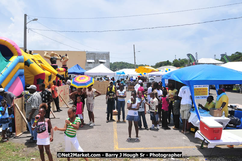 Lucea Cross the Harbour @ Lucea Car Park - All Day Event - Cross the Harbour Swim, Boat Rides, and Entertainment for the Family - Concert Featuring: Bushman, George Nooksl, Little Hero, Bushi One String, Dog Rice and many local Artists - Friday, August 1, 2008 - Lucea, Hanover Jamaica - Photographs by Net2Market.com - Barry J. Hough Sr. Photojournalist/Photograper - Photographs taken with a Nikon D300 - Negril Travel Guide, Negril Jamaica WI - http://www.negriltravelguide.com - info@negriltravelguide.com...!