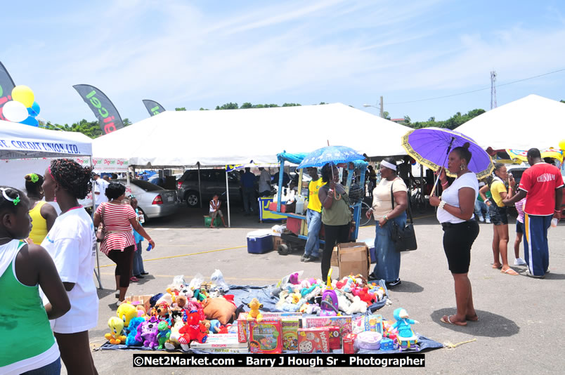 Lucea Cross the Harbour @ Lucea Car Park - All Day Event - Cross the Harbour Swim, Boat Rides, and Entertainment for the Family - Concert Featuring: Bushman, George Nooksl, Little Hero, Bushi One String, Dog Rice and many local Artists - Friday, August 1, 2008 - Lucea, Hanover Jamaica - Photographs by Net2Market.com - Barry J. Hough Sr. Photojournalist/Photograper - Photographs taken with a Nikon D300 - Negril Travel Guide, Negril Jamaica WI - http://www.negriltravelguide.com - info@negriltravelguide.com...!