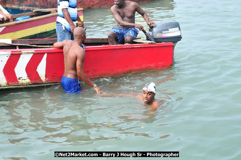 Lucea Cross the Harbour @ Lucea Car Park - All Day Event - Cross the Harbour Swim, Boat Rides, and Entertainment for the Family - Concert Featuring: Bushman, George Nooksl, Little Hero, Bushi One String, Dog Rice and many local Artists - Friday, August 1, 2008 - Lucea, Hanover Jamaica - Photographs by Net2Market.com - Barry J. Hough Sr. Photojournalist/Photograper - Photographs taken with a Nikon D300 - Negril Travel Guide, Negril Jamaica WI - http://www.negriltravelguide.com - info@negriltravelguide.com...!