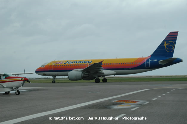 Air Jamaica Airline - Landing & Take Off - MBJ Airports Limited - Sangster International Airport - Domestic Terminal - Montego Bay, St James, Jamaica W.I. - MBJ Limited - Transforming Sangster International Airport into a world class facility - Photographs by Net2Market.com - Negril Travel Guide, Negril Jamaica WI - http://www.negriltravelguide.com - info@negriltravelguide.com...!