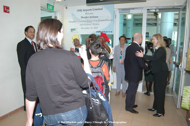 MBJ Airports Limited Welcomes WestJet Airlines - Inaugural Scheduled Service From Toronto Pearsons International Airport - Monday, December 10, 2007 - Sangster International Airport - MBJ Airports Limited, Montego Bay, Jamaica W.I. - Photographs by Net2Market.com - Barry J. Hough Sr, Photographer - Negril Travel Guide, Negril Jamaica WI - http://www.negriltravelguide.com - info@negriltravelguide.com...!