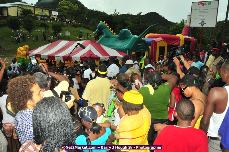 Usain Bolt of Jamaica - The Fastest Man In The World  - Usain Bolt Homecoming Celebrations - Press Conference at the Grand Bahia Principe &amp; Sherwood Content - Waldensia Primary School - Photographs by Net2Market.com - Barry J. Hough Sr. Photojournalist/Photograper - Photographs taken with a Nikon D300 - Negril Travel Guide, Negril Jamaica WI - http://www.negriltravelguide.com - info@negriltravelguide.com...!